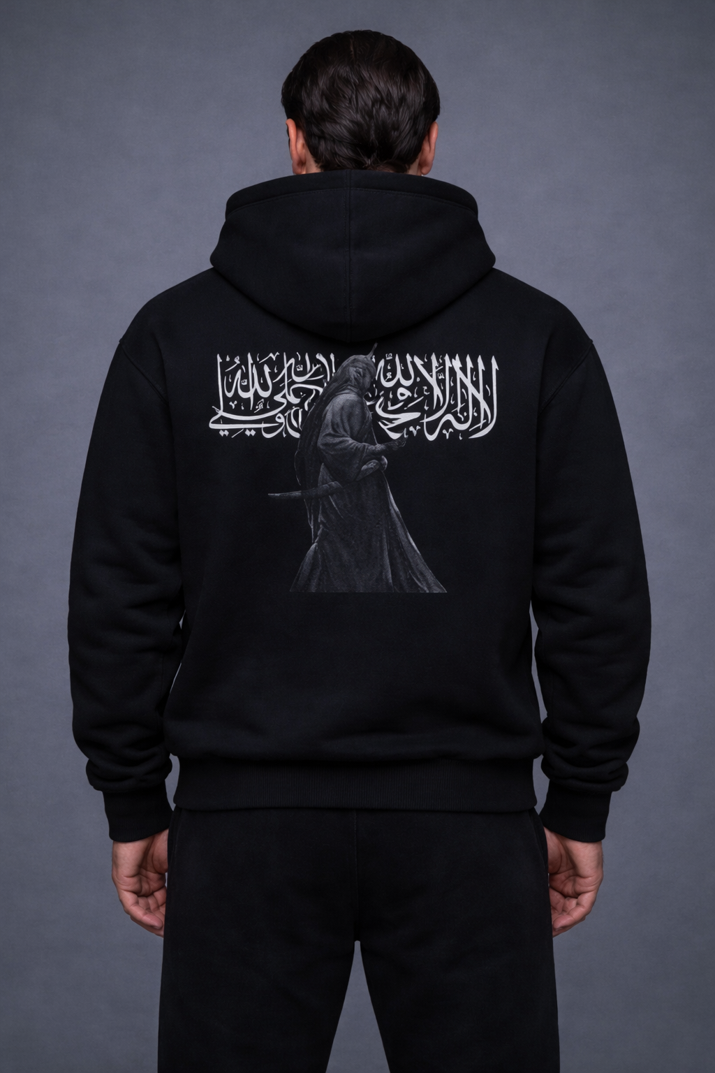 Our Shahada Oversized Hoodie is a bold fusion of sacred calligraphy and historical artistry.