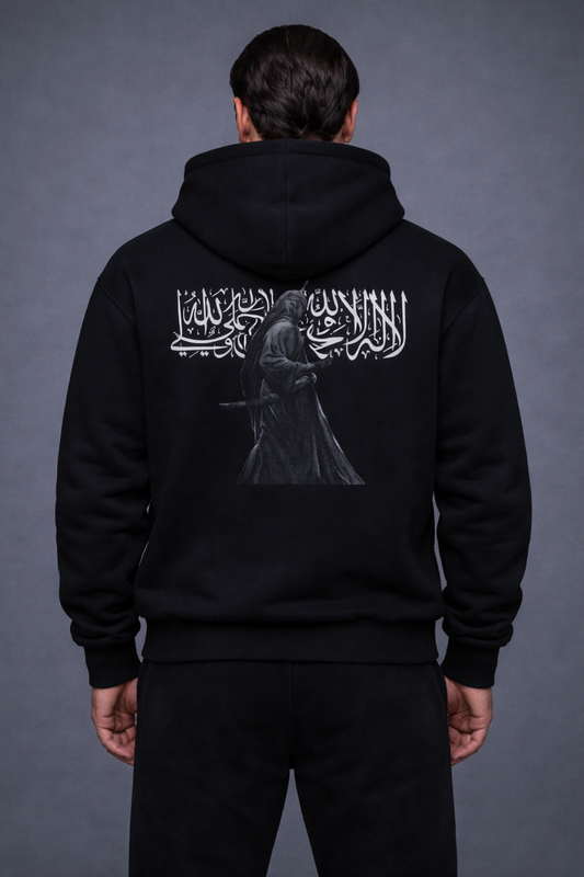 Our Shahada Oversized Hoodie is a bold fusion of sacred calligraphy and historical artistry.